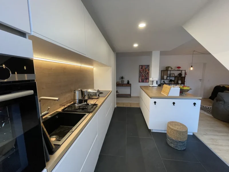 Maßgeschneiderte Kochinsel meets innovative Küchentechnik 